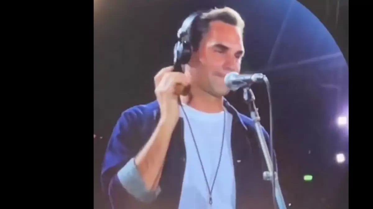 Roger Federer on stage at the Coldplay concert.
