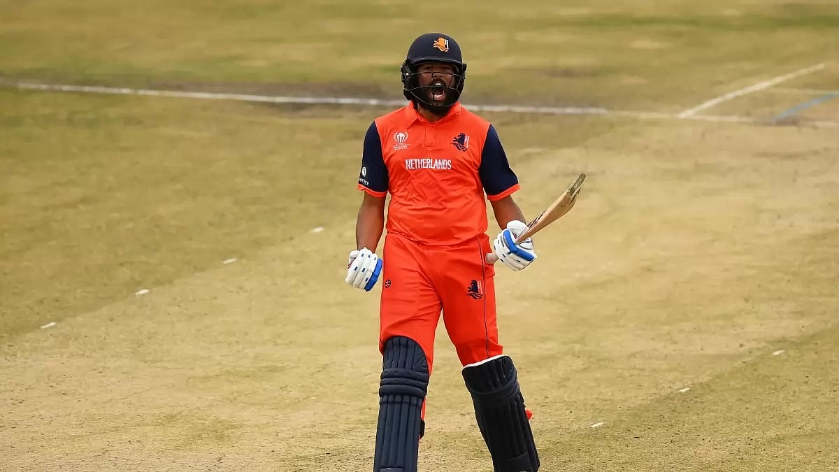 Vikramjit celebrates after reaching his hundred against Oman on Monday.