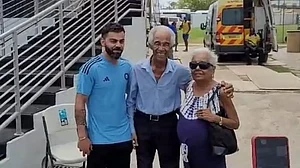Virat Kohli pictured alongside Gary Sobers, who was accompanied by his wife.