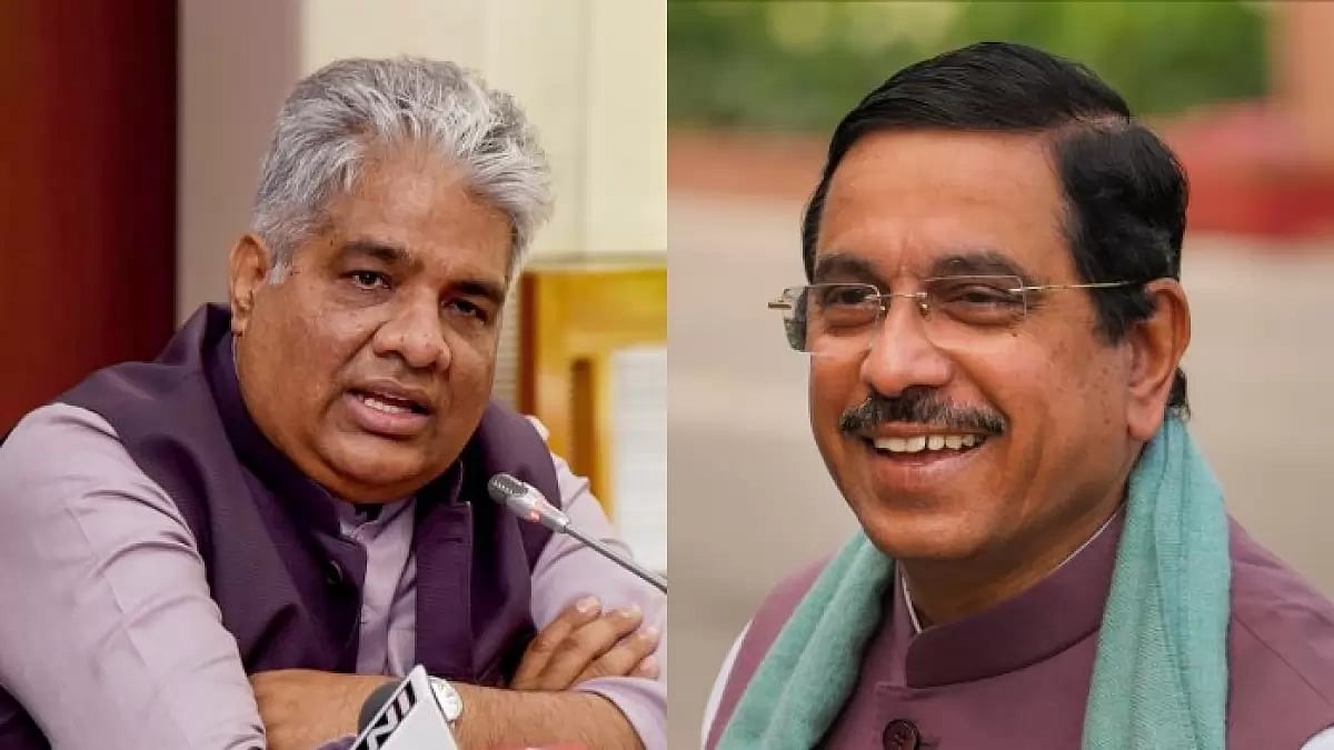 Union ministers Pralhad Joshi (R) and Bhupender Yadav