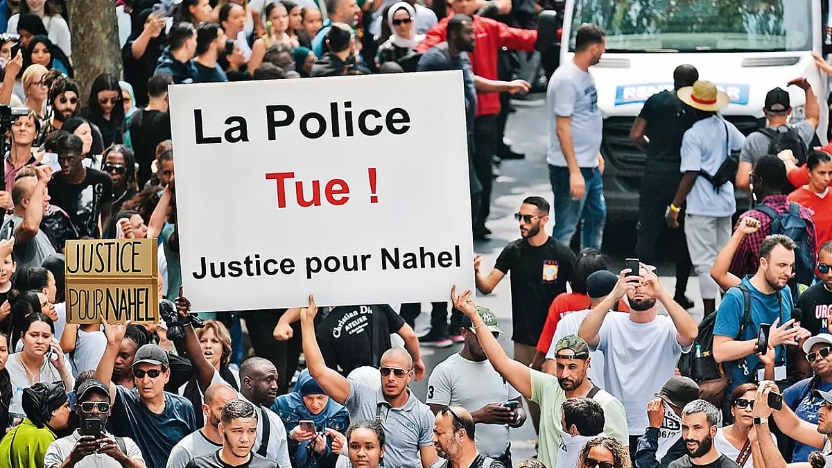 No More Brute Force: People gather in the streets of Paris to protest against the death of Nahel Merzouk   