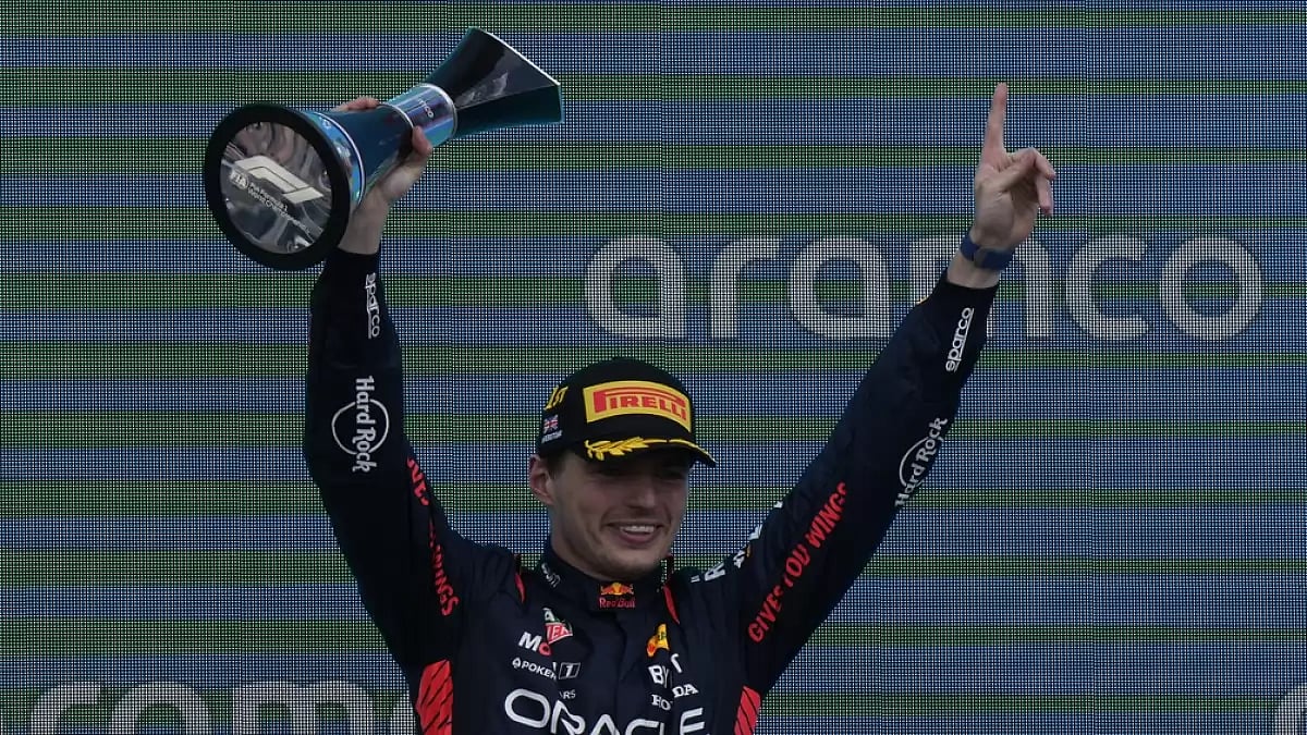 Verstappen celebrates with the trophy after winning the British GP on Sunday.