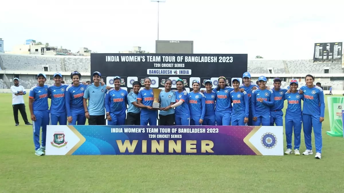 Indian women's team pose with the trophy after winning the series 2-1.