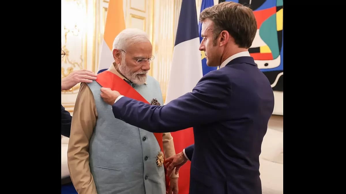 PM Modi receiving the Grand Cross of the Legion of Honour from French President Emmanuel Macron