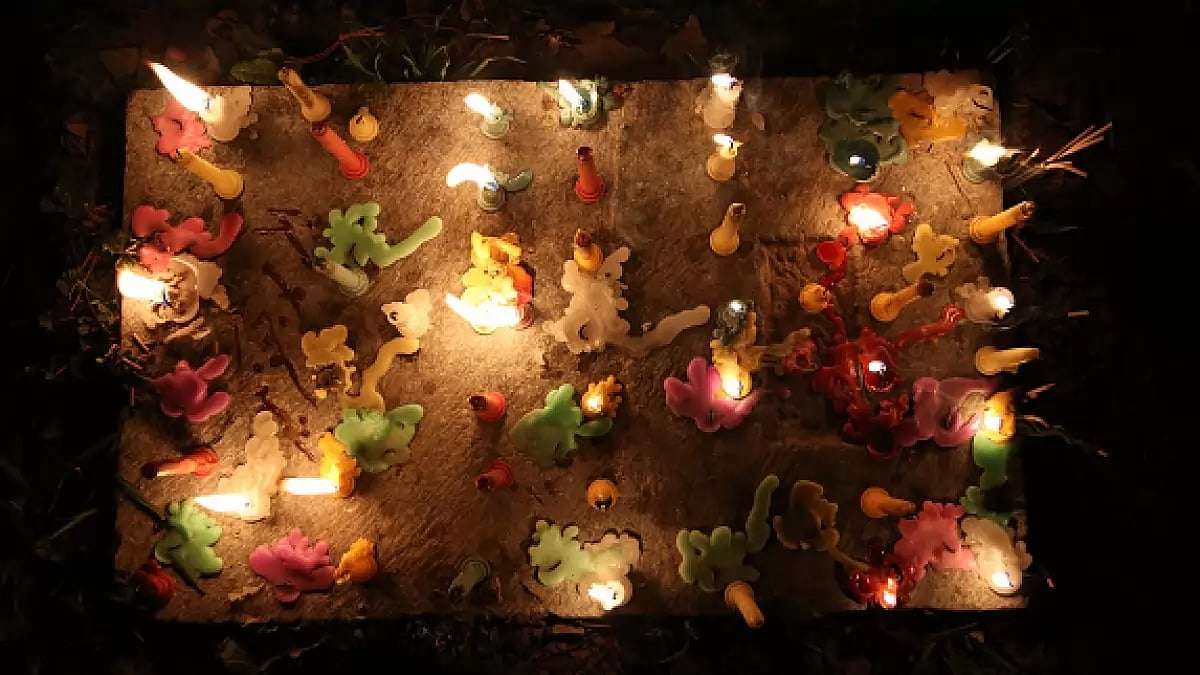 Shiite Muslims light candles on the gravestones to mark Lailat al-Barat in Srinagar, Kashmir