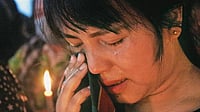 Hugs and Tears: A woman at a candlelight vigil organised by Chin Refugee Committee in Delhi to pay tribute to those who died during demonstrations against the military coup in Myanmar 