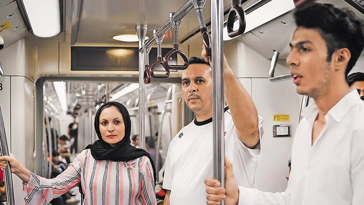 Second Home: Samira Faizi with her husband Javed and younger son Sadiq - null