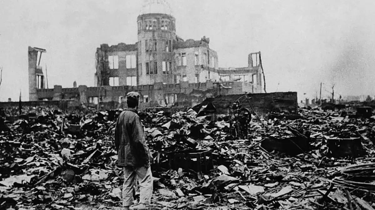 A survivor walks through the ruins of atomic-bombed Hiroshima in August 1945.