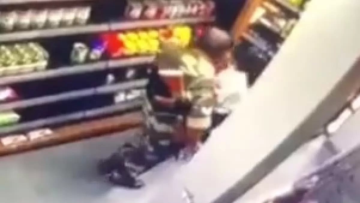 Visual from CCTV footage of a BSF jawan molesting a woman inside grocery store in Manipur
