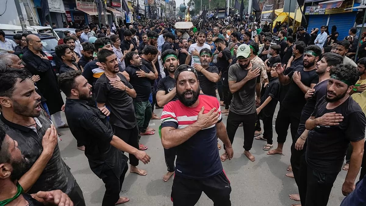 Shia Muslims mourn during a procession on the day of Ashura, in New Delhi.