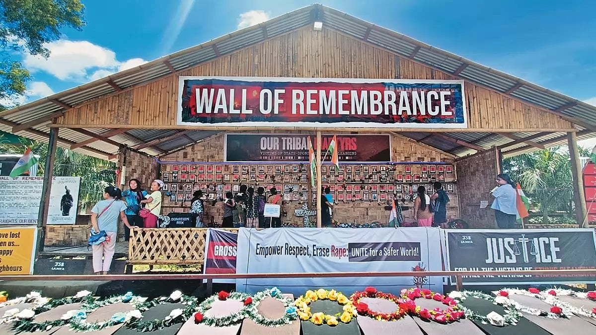 Tribute To The Dead: The ‘Wall of Remembrance’ with pictures of people who died in the ethnic confli