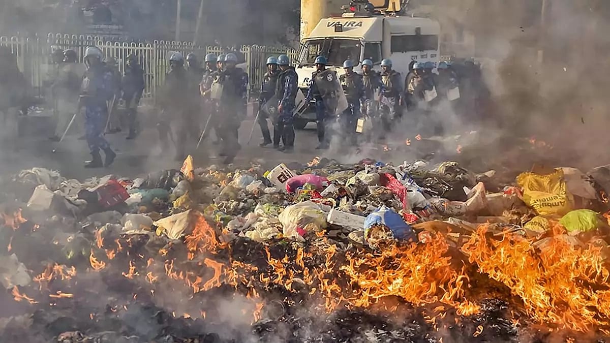 Security personnel conducting flag march during clashes in north-east Delhi