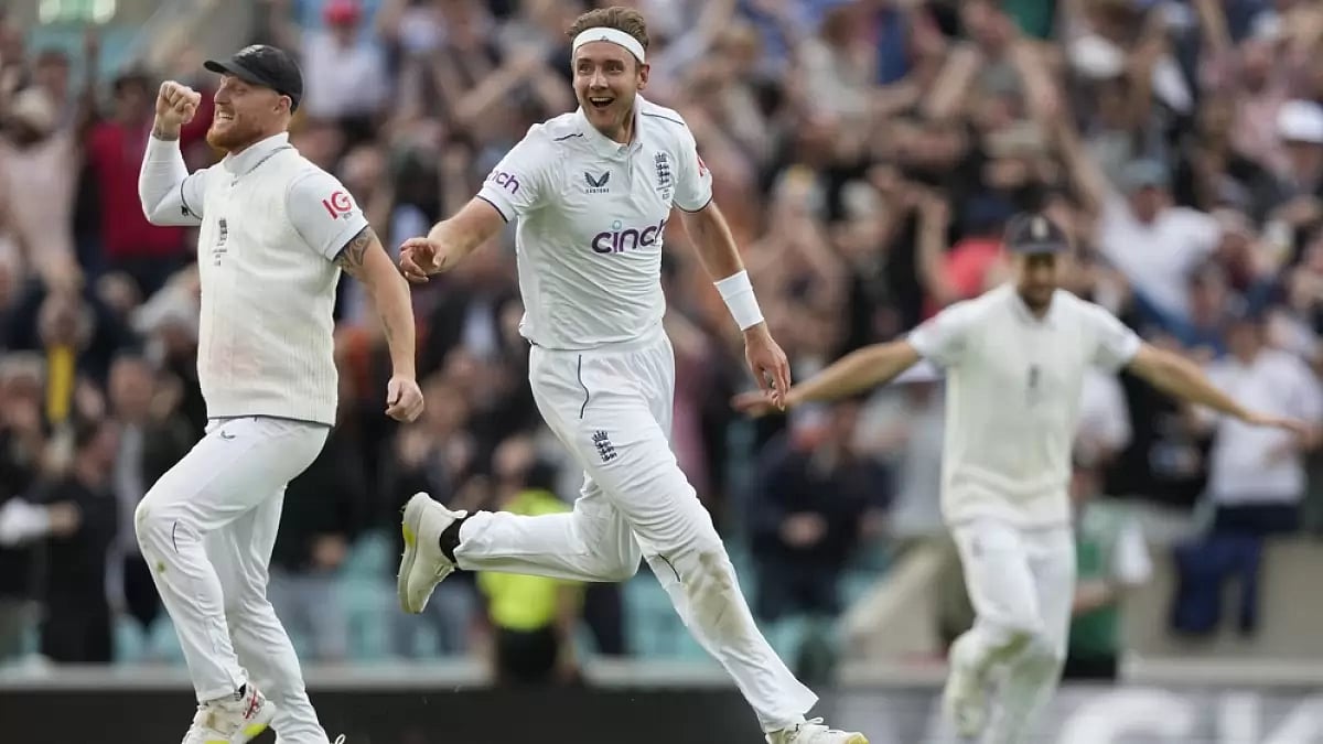 Stuart Broad and Ben Stokes celebrate the dismissal of Australia's Todd Murphy at The Oval.