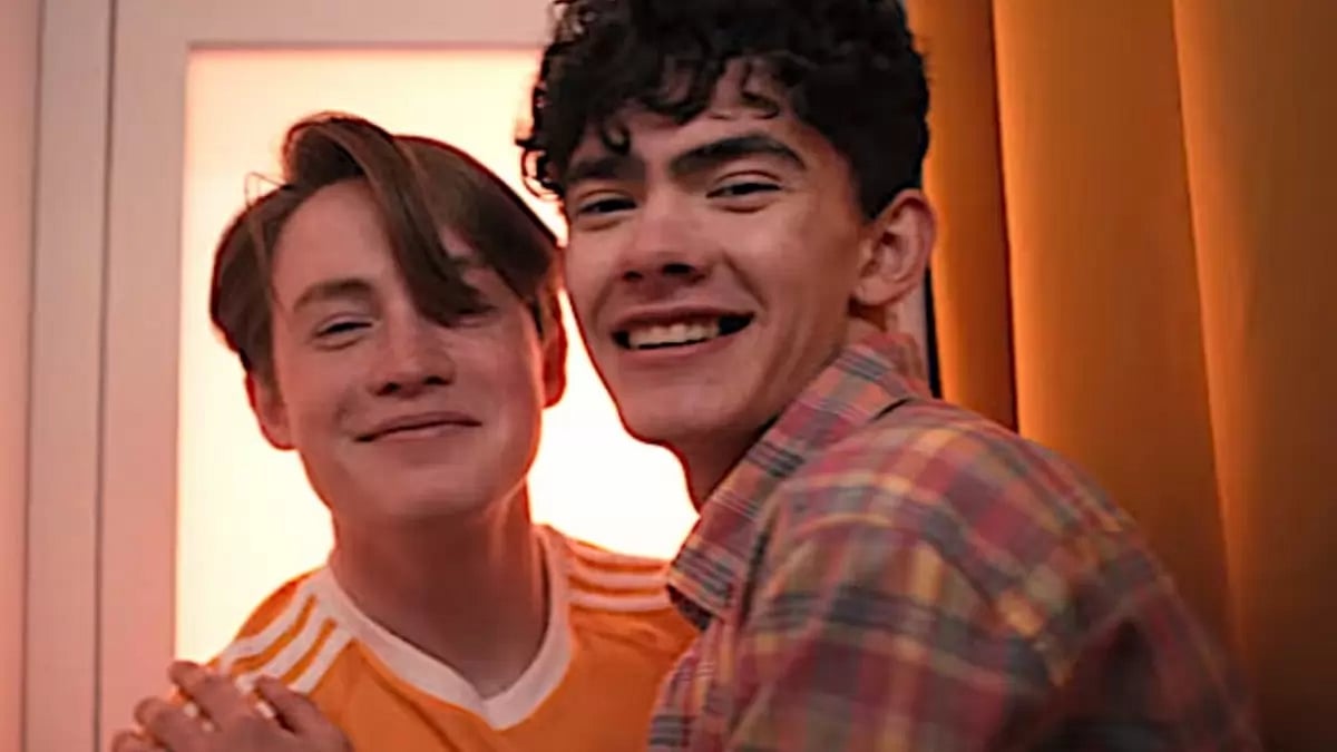  Nick and Charlie, laughing and embracing in bliss