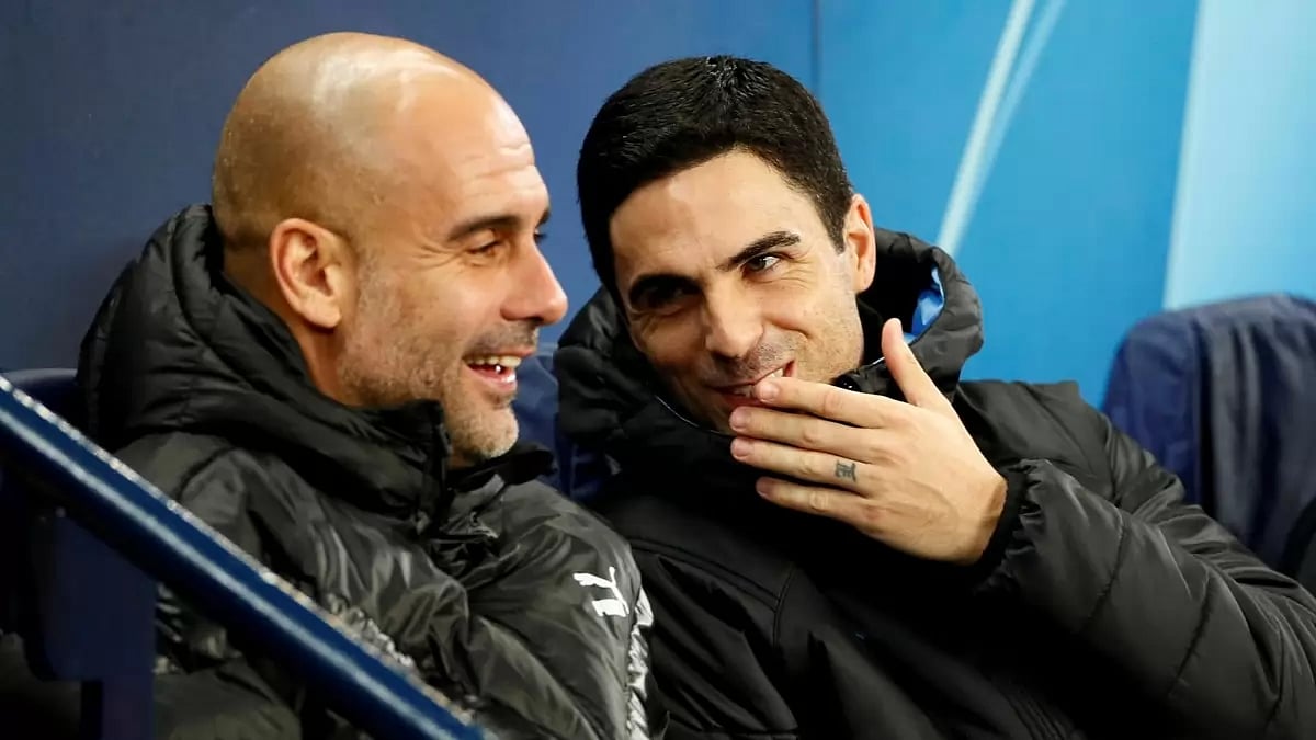 Manchester City manager Pep Guardiola, left, and Arsenal manager Mikel Arteta.
