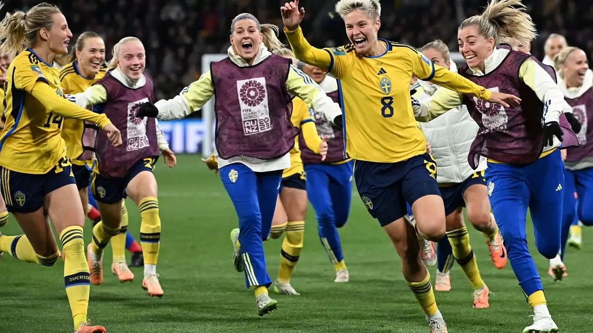 Sweden players celebrate after scoring the winning penalty against USA.