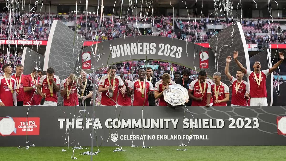 Arsenal players celebrate the Community Shield win against City at Wembley.