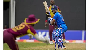 India's Tilak Varma plays a shot against West Indies during the 2nd T20I cricket match.
