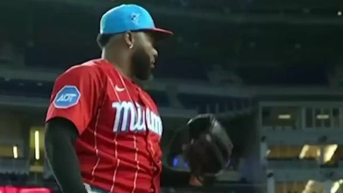 Johnny Cueto can be seen pitching