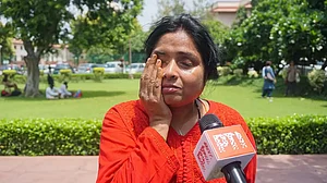Nidhi Shukla, sister of deceased poet Madhumita Shukla, speaks with the media at the Supreme Court complex, in New Delhi.