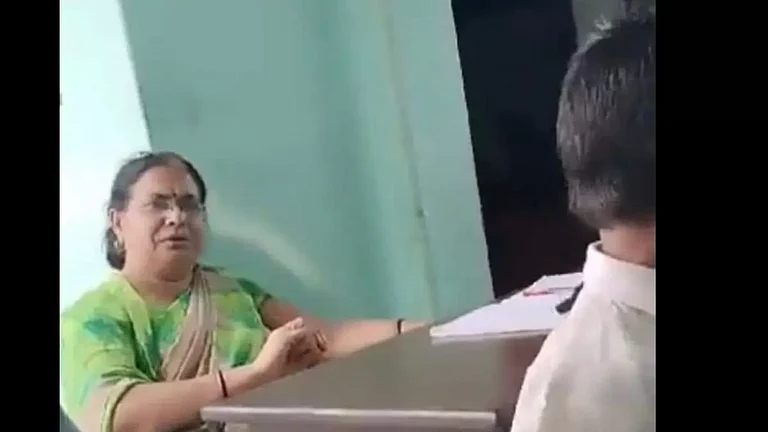 Uttar Pradesh school teacher who encouraged slapping a Muslim student on Friday - null