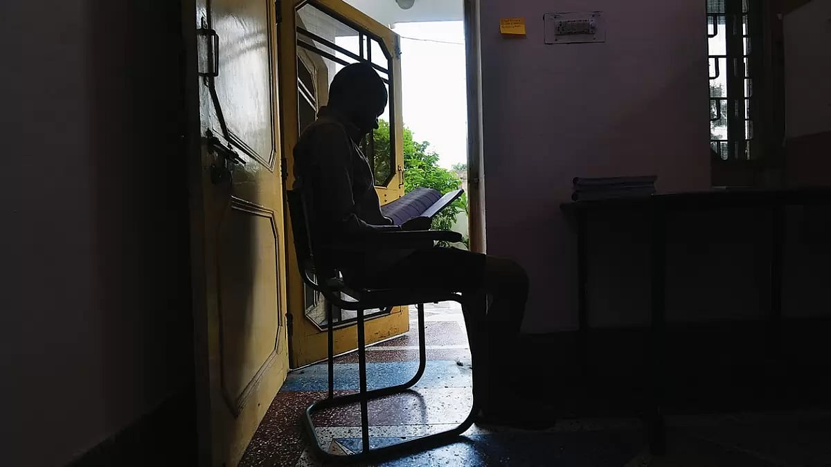 Struggles and Challenges: A student from Bihar studying in his room where he stays as a paying guest 