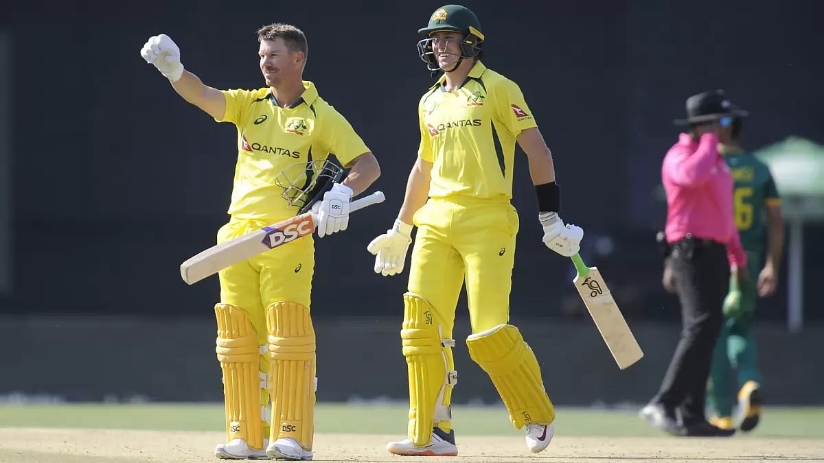 David Warner (L) for Australia.
