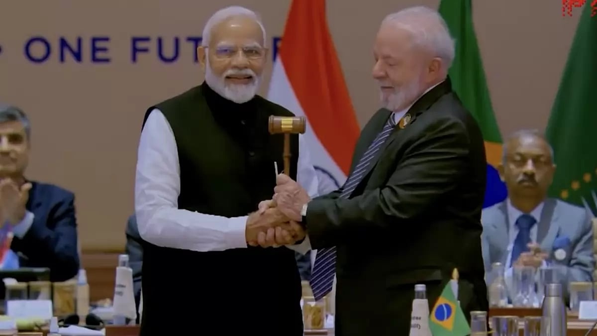 PM Modi hands over G20 presidency to Brazil at the closing session of the summit.