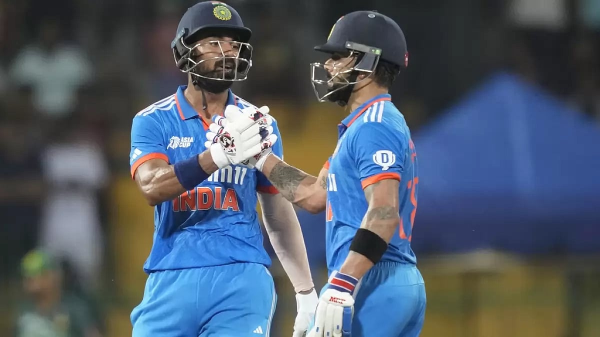 KL Rahul (L) and Virat Kohli en route their record stand in Colombo on Monday