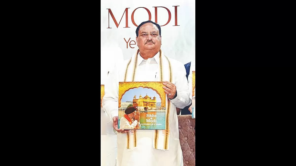 JP Nadda BJP National President, releasing the Coffee Table Book