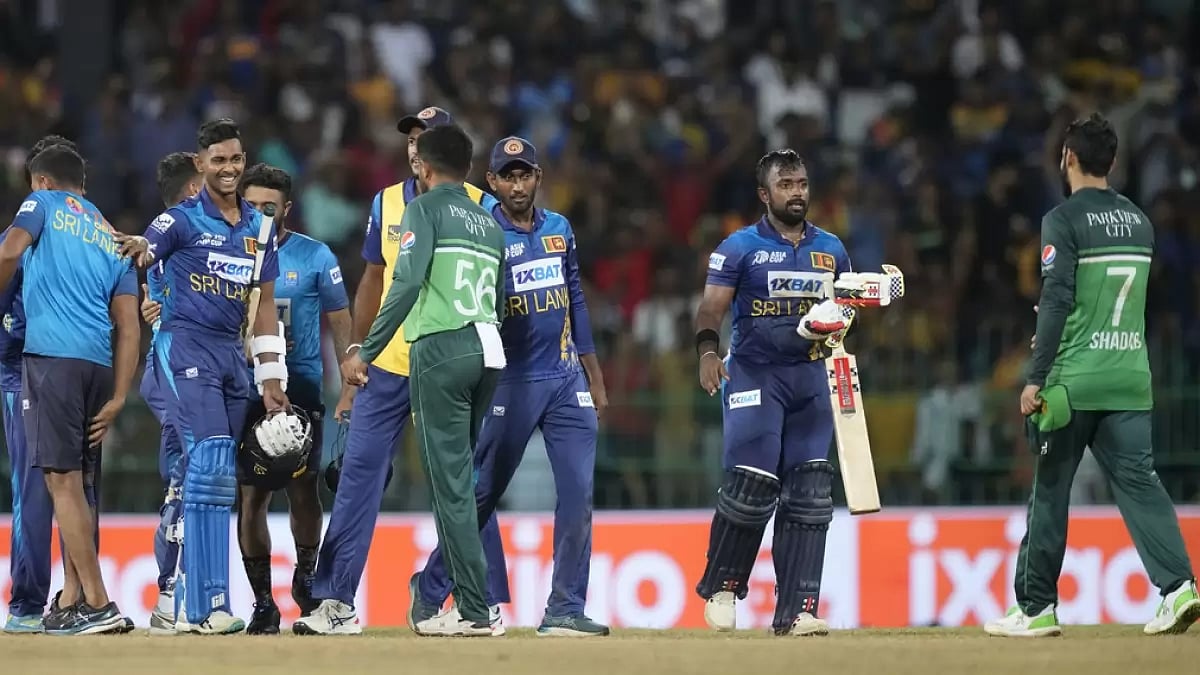 Sri Lankan players celebrate their two wicket win in the Asia Cup match between Pakistan and Sri Lan