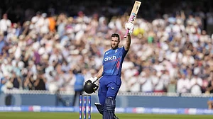 Dawid Malan celebrates scoring a century at Lord's on Friday.