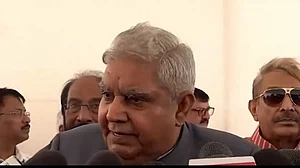 Rajya Sabha Chairman Jagdeep Dhankar hoists the national flag at the new Parliament building.