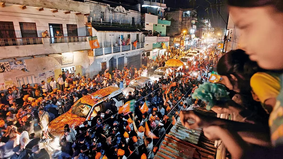 Campaign Time; Supporters at a roadshow taken out by Narendra Modi in Varanasi during the general elections