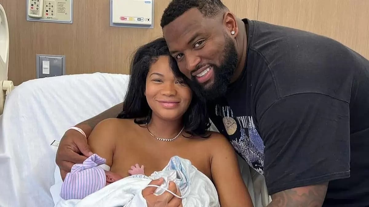 Chanel and Davon with their first child.