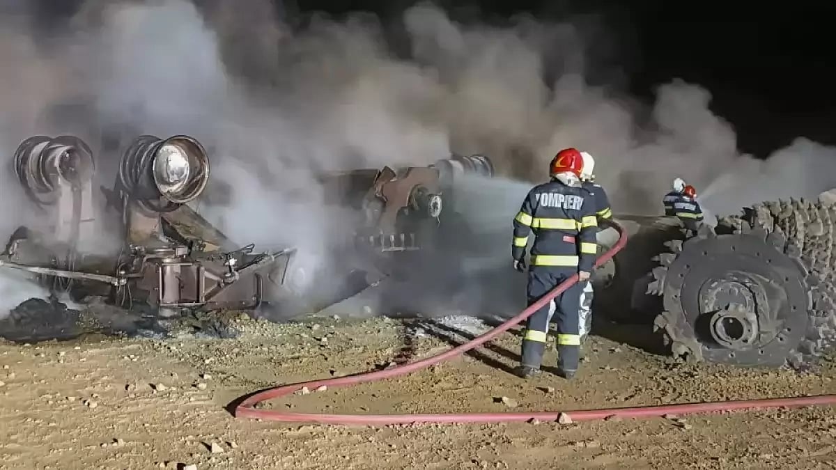 Firefighters at the site of explosion in Romania 