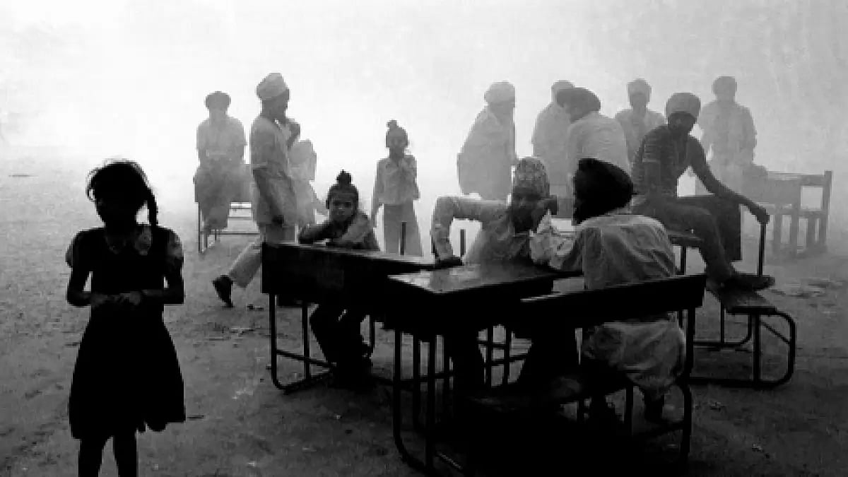 Sikh refugees gather at a New Delhi school, seeking shelter following assassination of Indira Gandhi