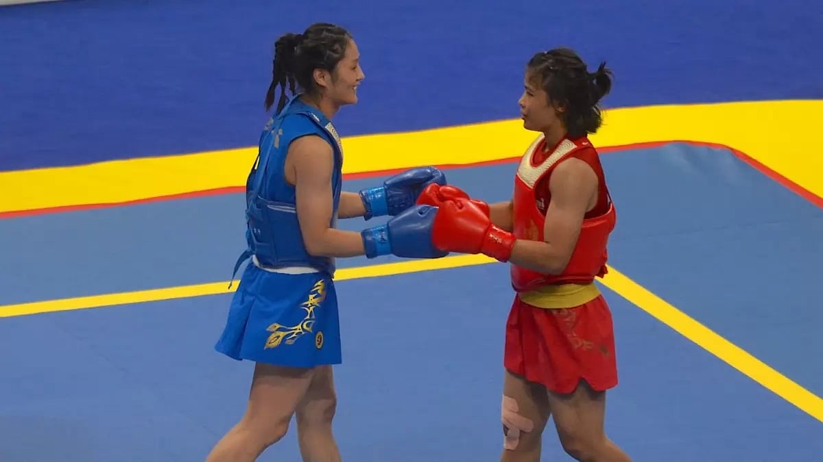India's Naorem Roshibina Devi (Right) in the Wushu final