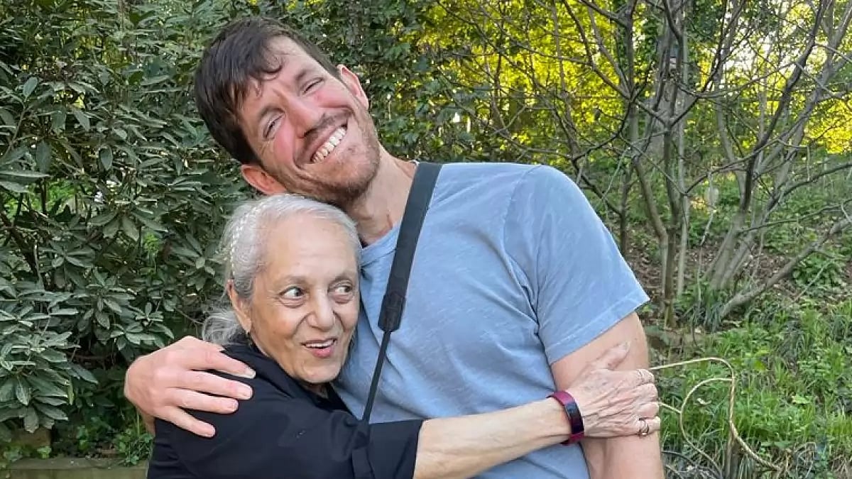 HONY founder Brandon Stanton (right) at one of his recent shoot locations