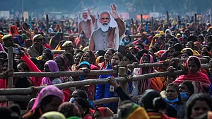 Women from various districts of UP attending a BJP rally.