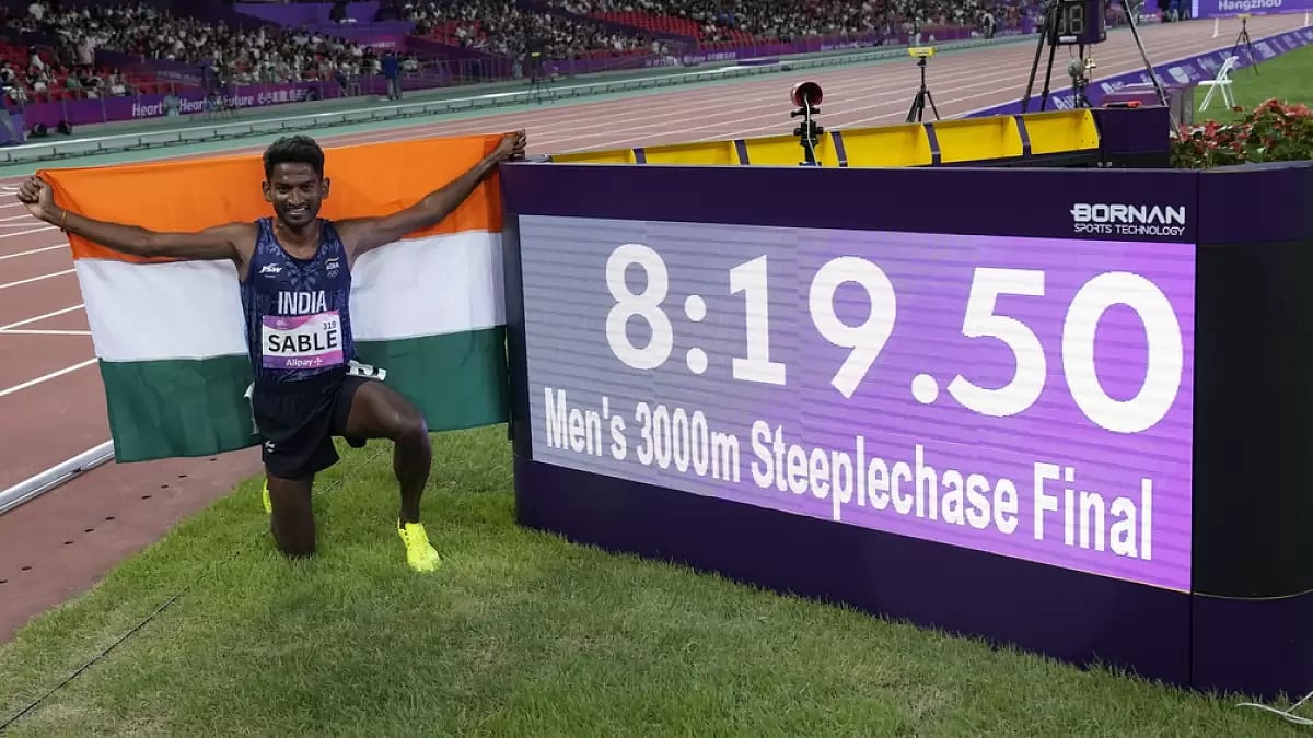 India's Avinash Mukund Sable celebrates after winning the men's 3000m steeplechase final.