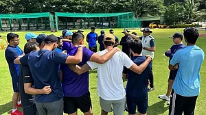 Indian Men's Cricket team with coach VVS Laxman ahead of their opener against Nepal on Tuesday