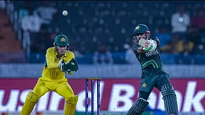 Pakistan's Babar Azam (R) bats during the World Cup warm-up match on Tuesday.