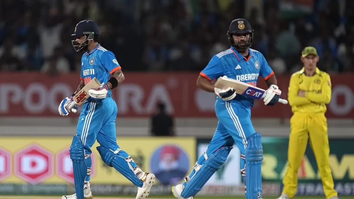 Virat Kohli (L) and Rohit Sharma during the third ODI against Australia in Rajkot