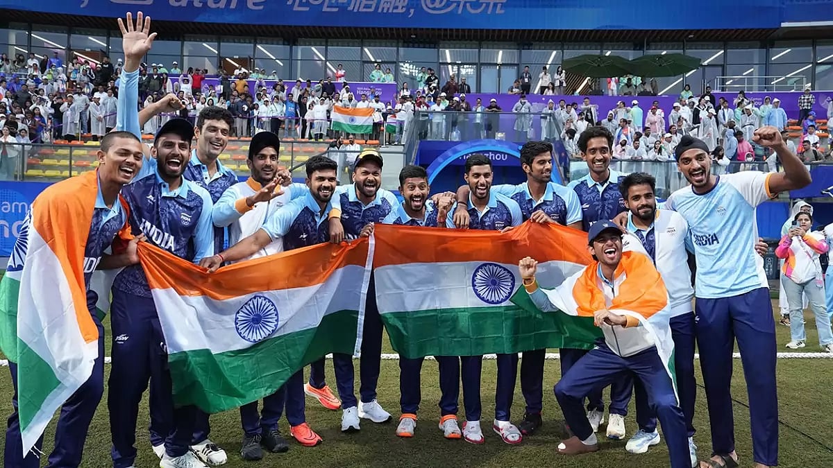 Indian players celebrate after winning the Men's Gold Medal cricket match.