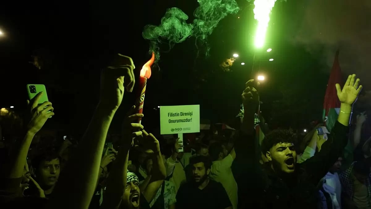 People waving Palestinian flags during a rally celebrating the attacks by Hamas group on Israel - null