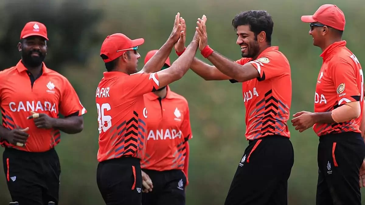 Canada players celebrate a wicket during their match against Bermuda.