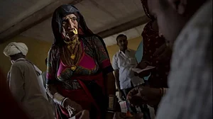 An Indian woman has her finger inked before voting at a polling station in Jodhpur, Rajasthan