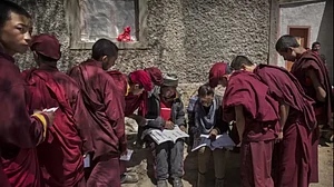 Buddhist monks from the Drukpa wait outside a polling station to vote (Representative image)