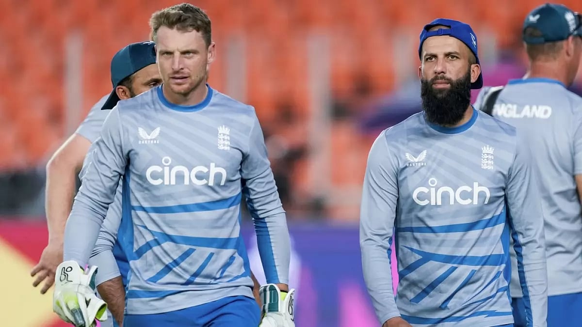 Jos Buttler (L) and Moeen Ali during training.